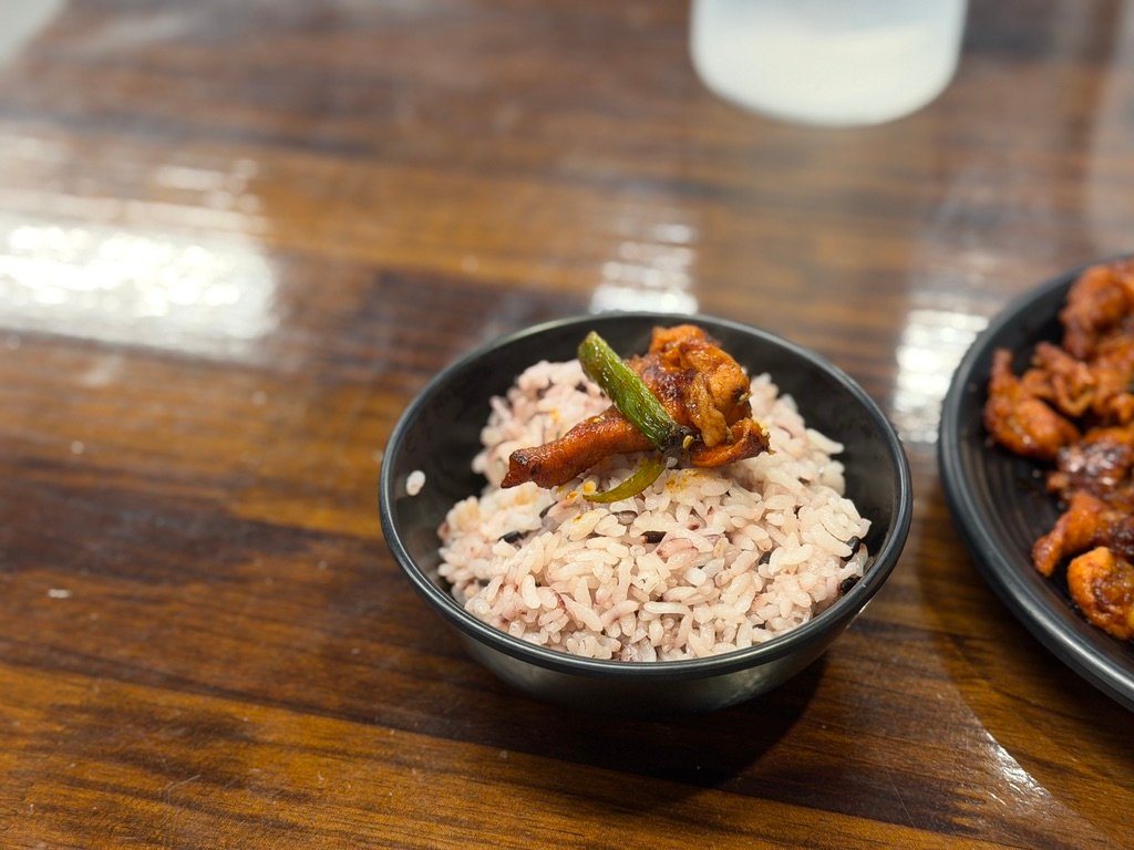 ide dishes including soy-marinated onions and white kimchi