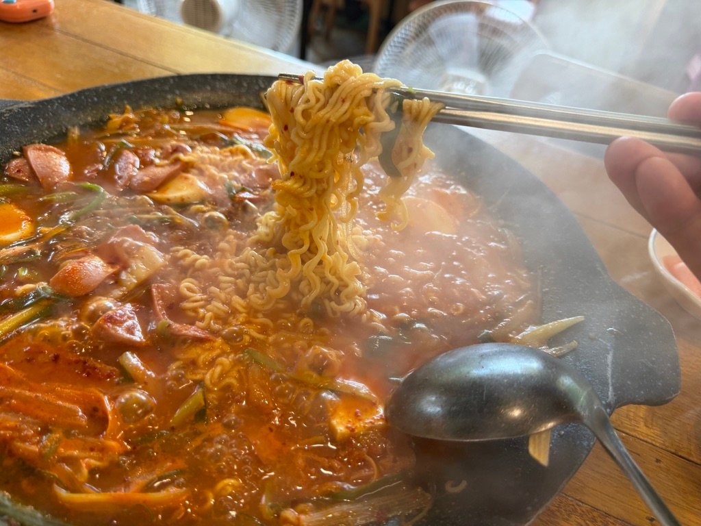 Bottle of Chum-Churum soju served with budae-jjigae
