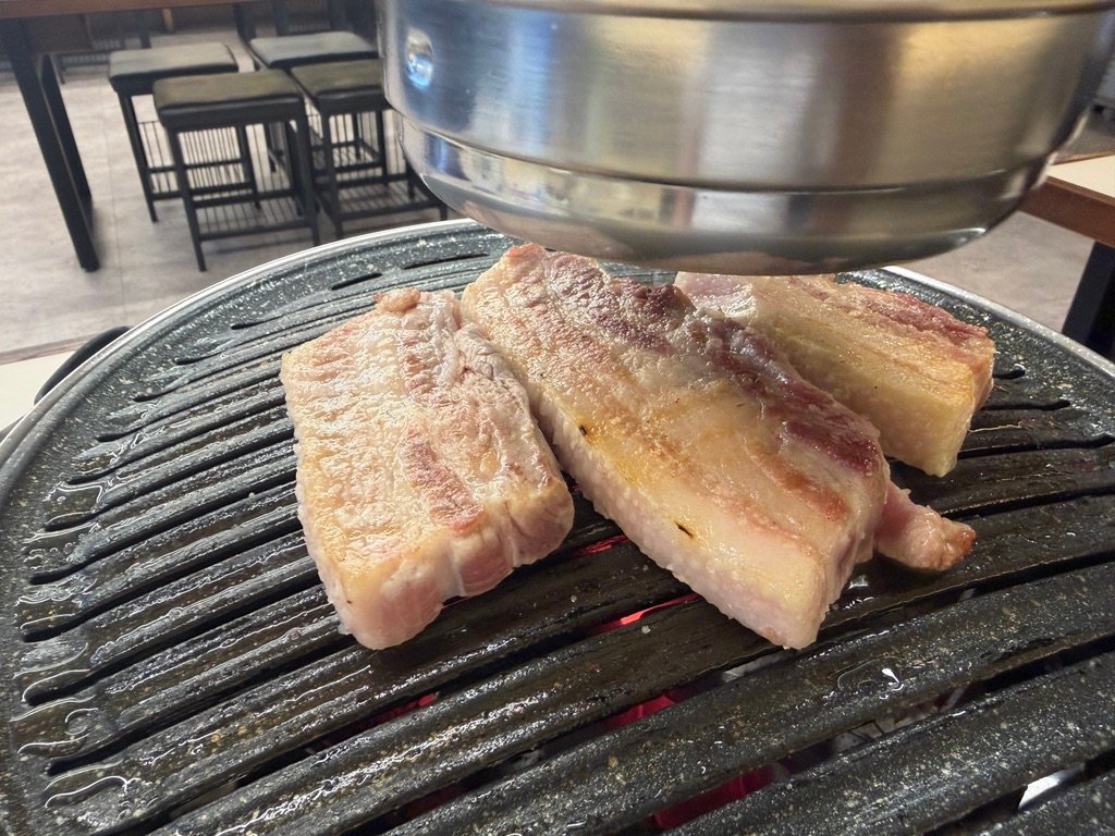 Fully grilled samgyeopsal pork belly ready to eat