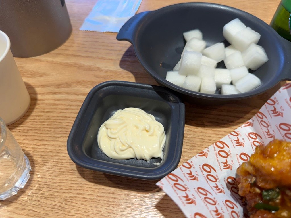Pickled radish and mayo served alongside fried chicken